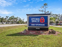 A sign for Store Space self storage at 26300